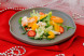 Salad with Kamchatka crab, tangerine, mango and nut dressing