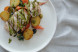 Chicken thigh in bacon with vegetables