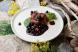 Venison steak with carrots and blackcurrant sauce
